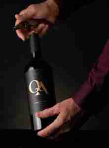 QA Opening a Bottle of QA with a Corkscrew 221x300 1