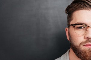 graphicstock half face of serious bearded man in glasses HIcj4tQu2e thumb