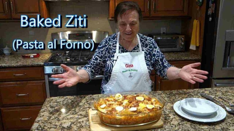 italian grandma makes baked ziti rigatoni pasta al forno AnyNZM1X73w
