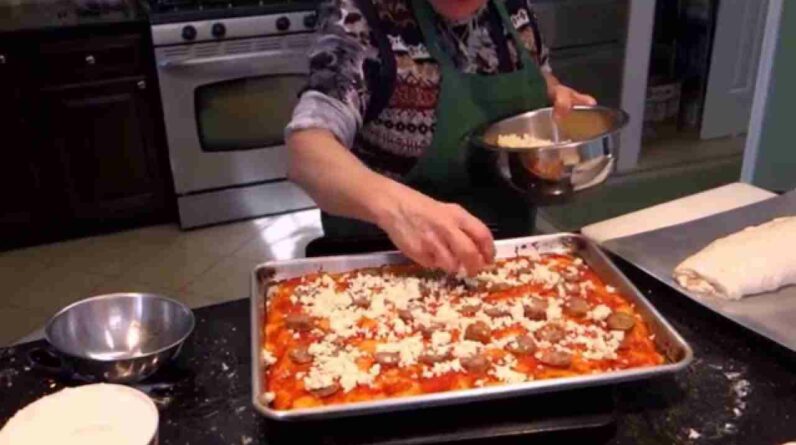 italian grandma makes pizza bread short version J3kZZCSxBn4